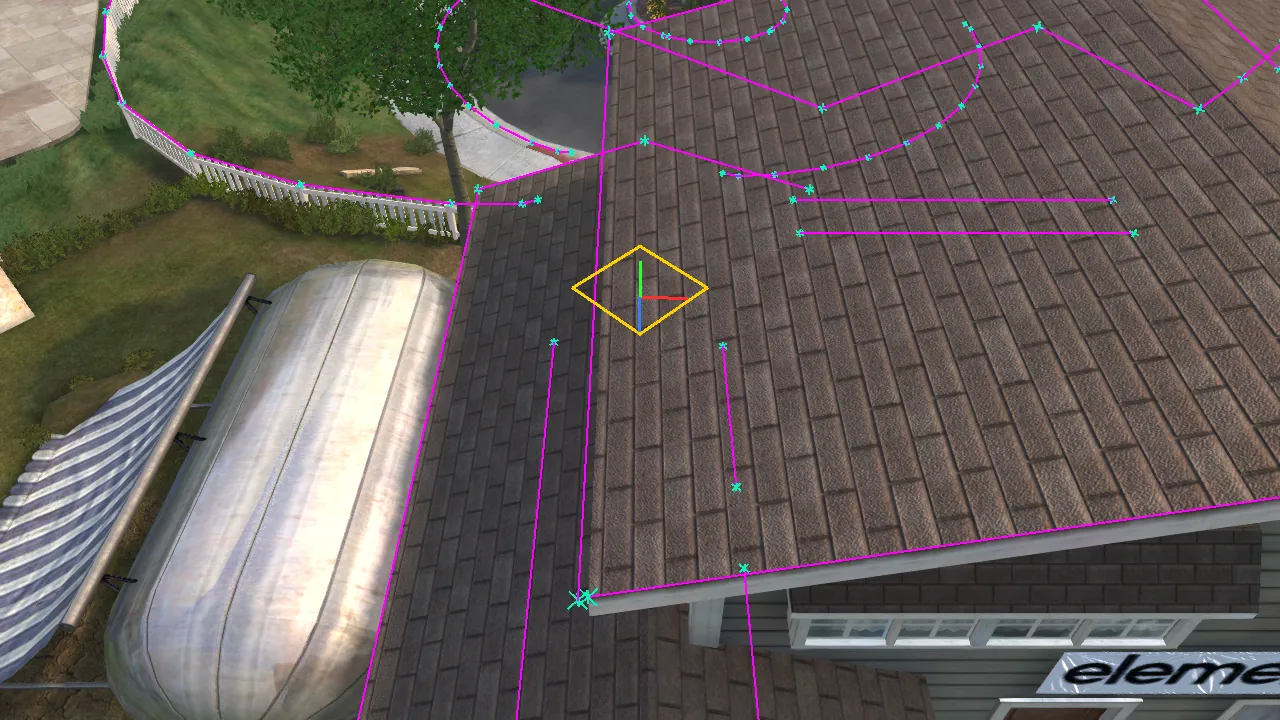 In game, seen from the free camera: grind rails outlined in pink and a selection gizmo drawn over a rooftop
